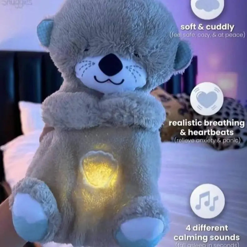 Juguete calmante para perros y gatos con forma de nutria que respira: música, movimiento y luz naranja, 3 pilas AAA